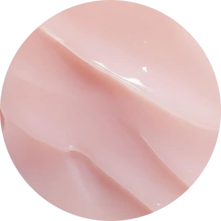 Smooth, diagonal folds of pale pink fabric or material.
