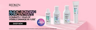 Redken hair care products featuring Acidic Bonding Concentrate line displayed in white bottles against a pink backdrop.