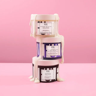 Stack of three FJK brand face masks or beauty products in white and purple containers.