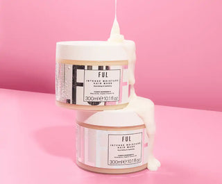 Two stacked white cosmetic cream jars with ’FIJI’ branding.